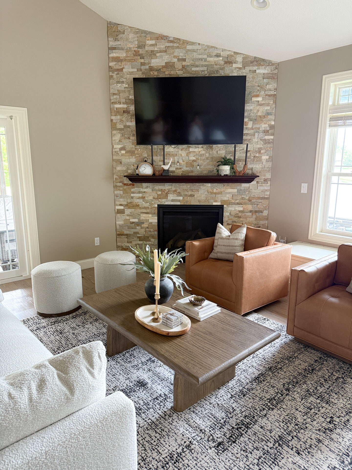 IMG_6111 A living room with two couches and a coffee table