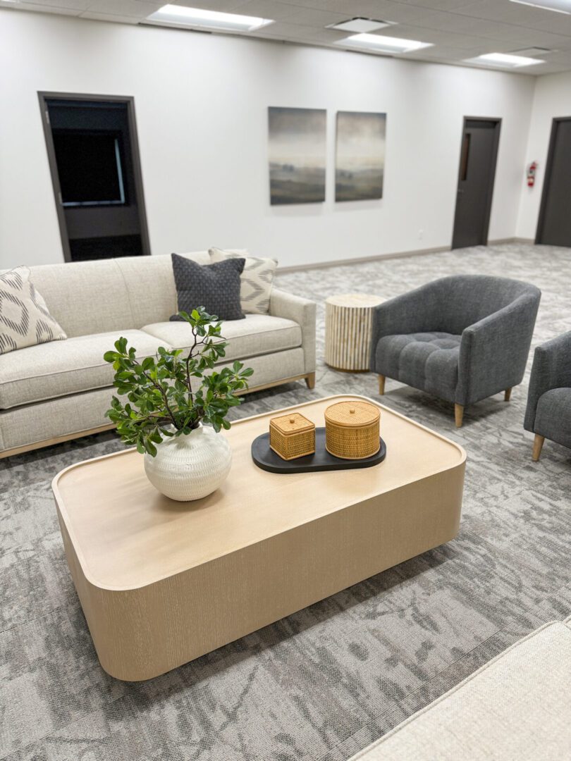 IMG_6201 A kitchen with a large island and chairs.